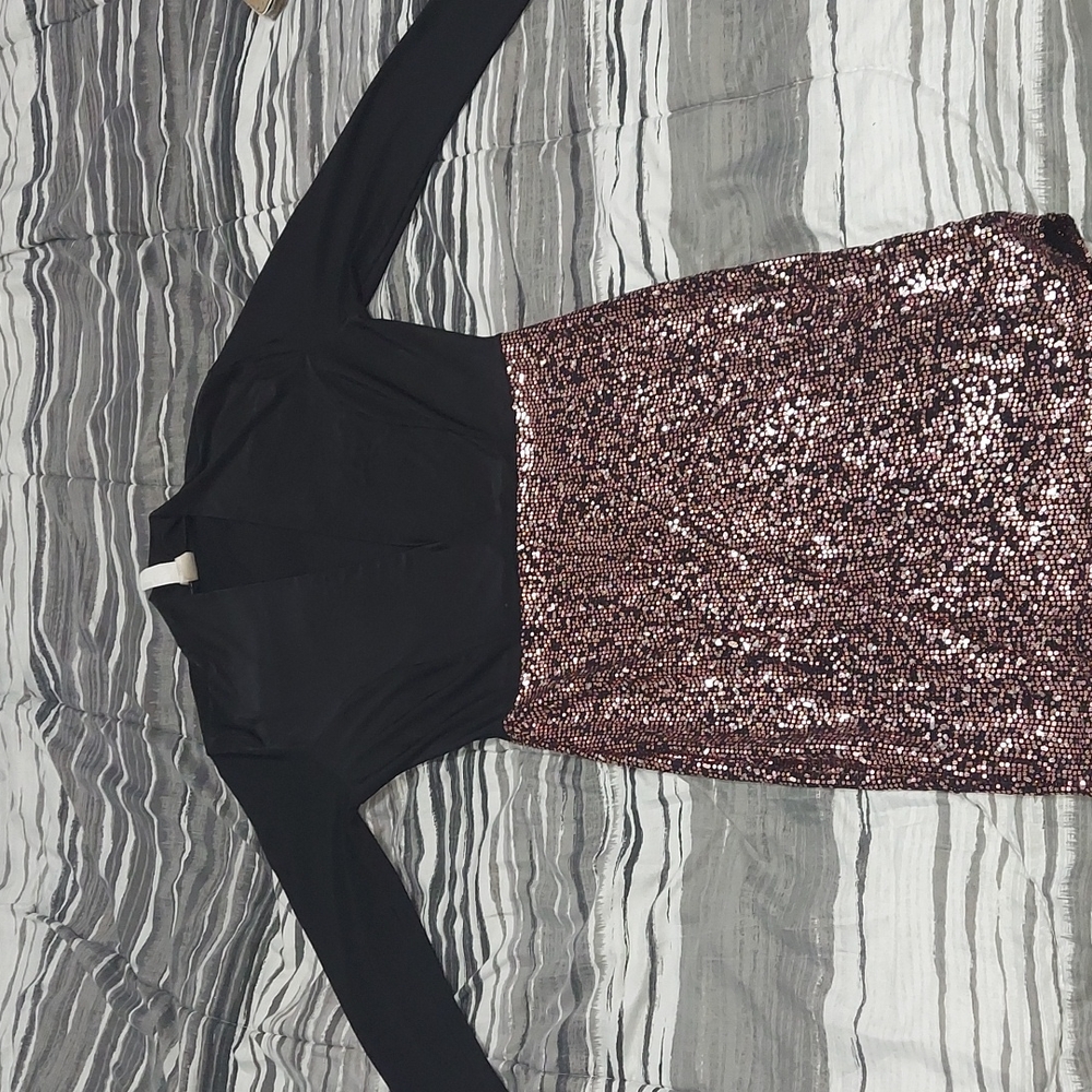 Womans super deep cut long sleeve sparkling dress